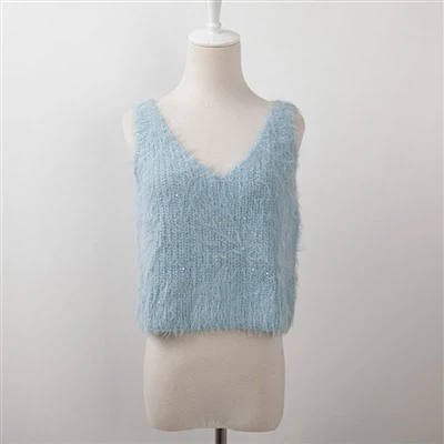 Kann ich einen schicken Wollpullover zu Stiefeln tragen?